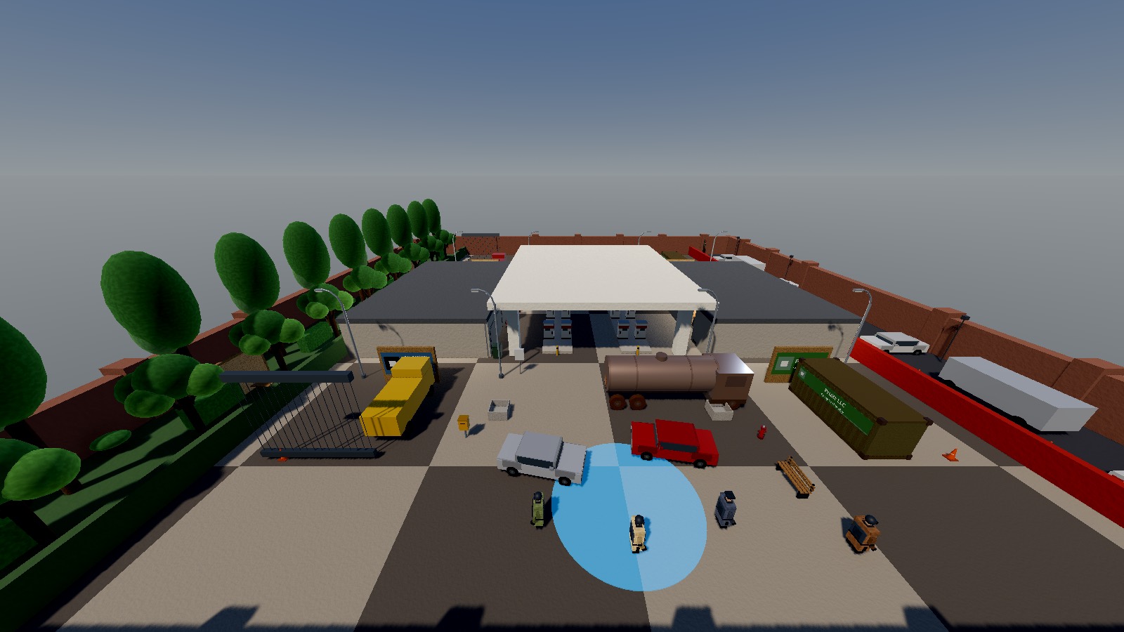 Die Karte »station« von oben: Tankstelle mit Vordach, Laden und Werkstatt, davor Fahrzeuge, ein Tankwagen, ein Container und vier Figuren am Startplatz.